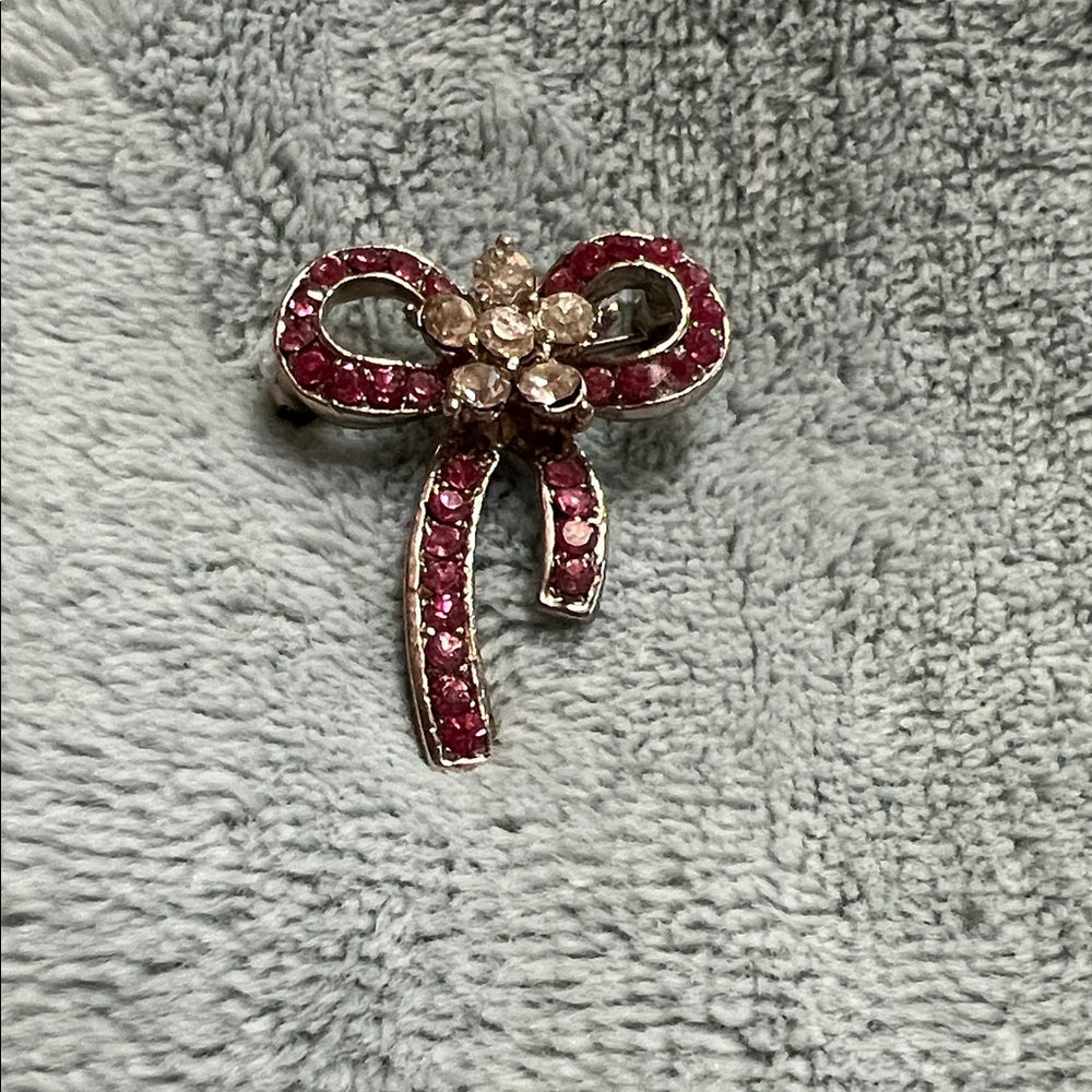 Elegant Bow-Shaped Pink and Silver Brooch
